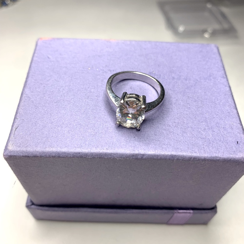 Solid silver (faux) Diamond ring in a beautiful setting.